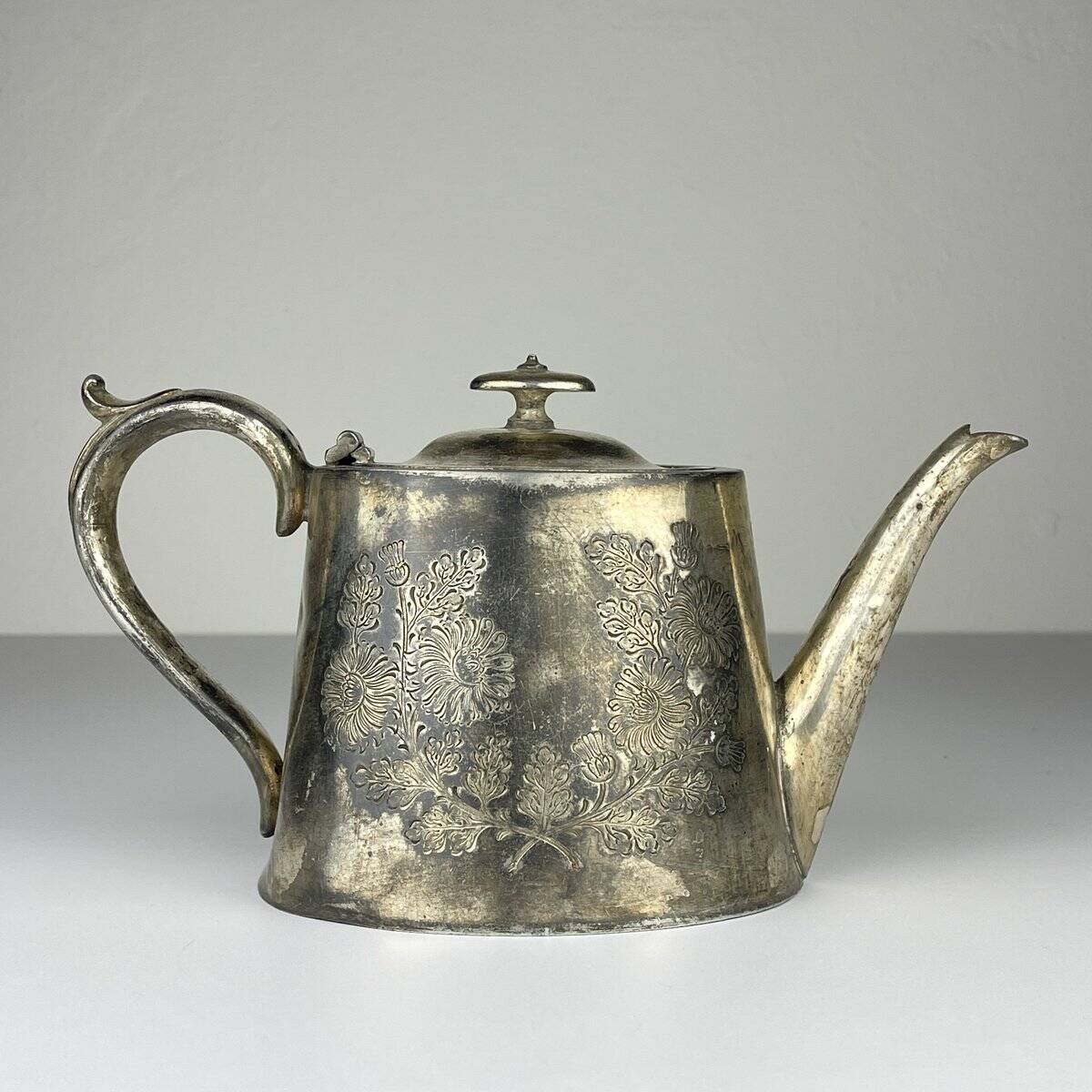 Antique silver-plated teapot from Sheffield, England, 1890-1910.