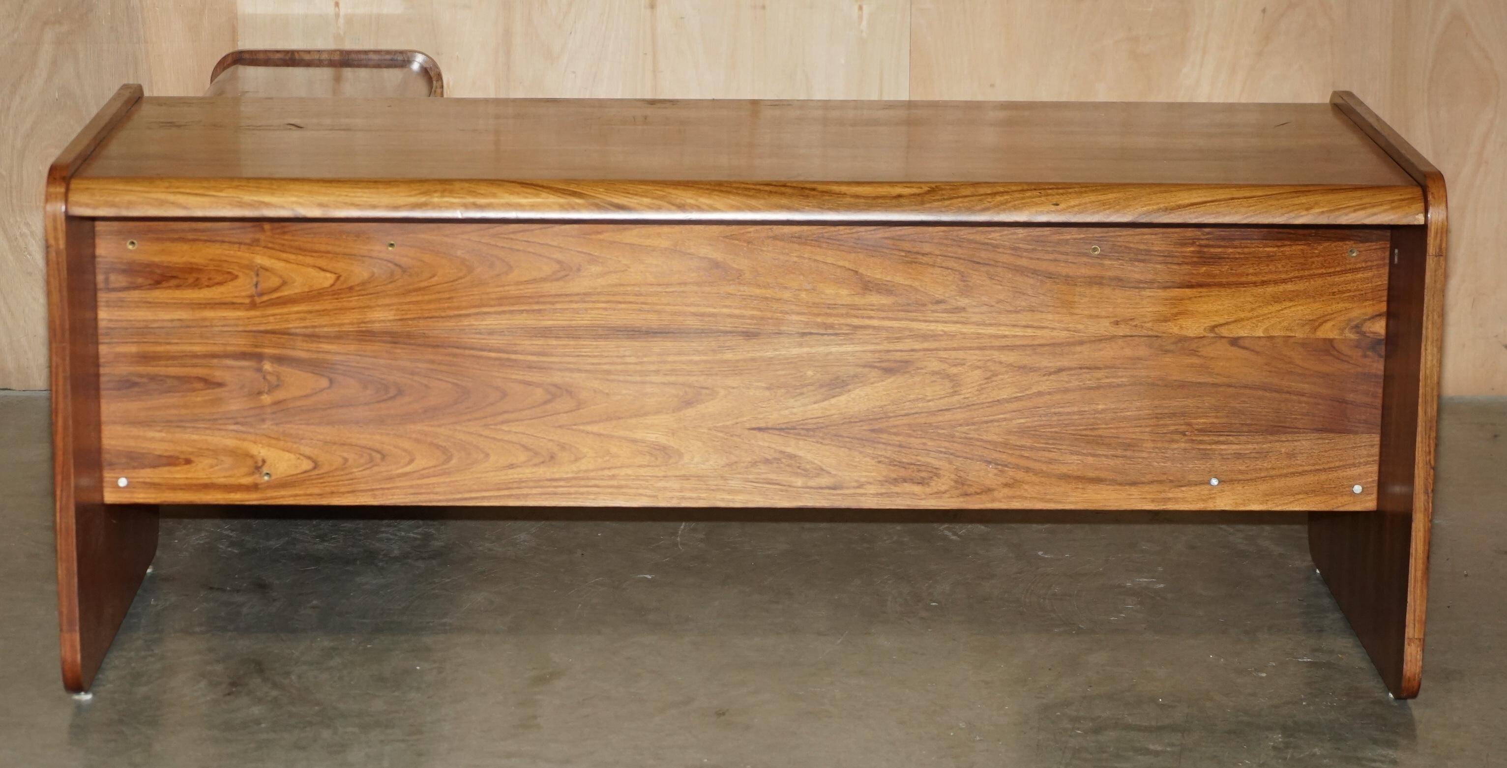 Mid-century modern right-angle desk in Brazilian wood.