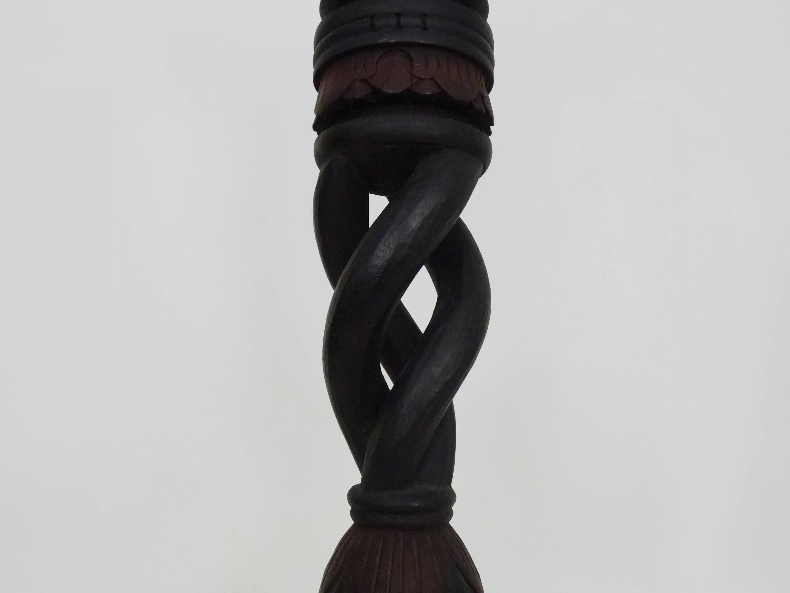 Twisted and engraved blackened wooden pedestal. 1960s 70s.