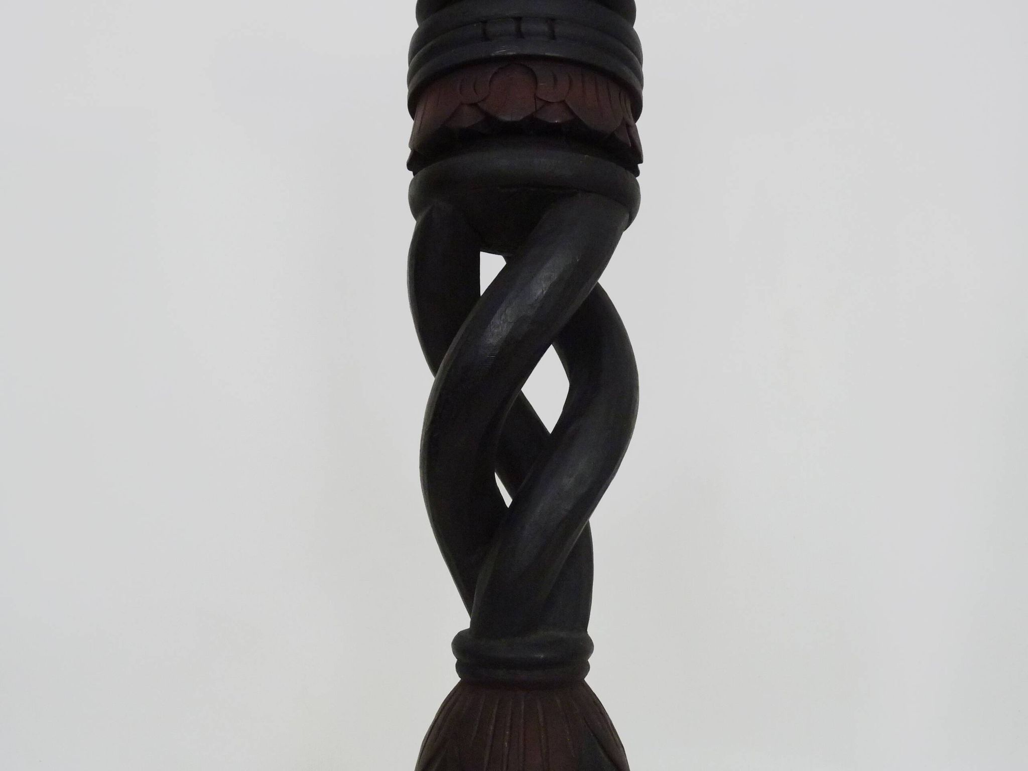 Twisted and engraved blackened wooden pedestal. 1960s 70s.