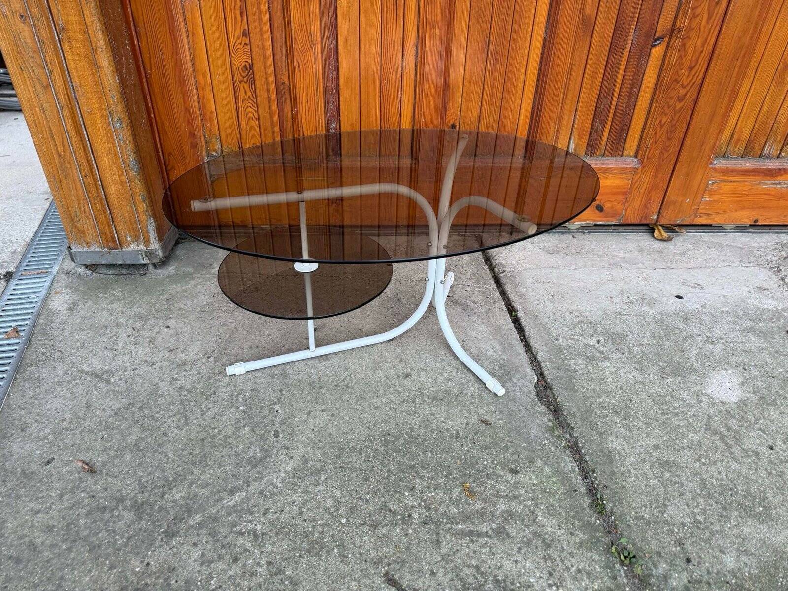 Coffee oval table with metal legs and smoky glass top, 1990s