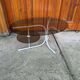 Coffee oval table with metal legs and smoky glass top, 1990s