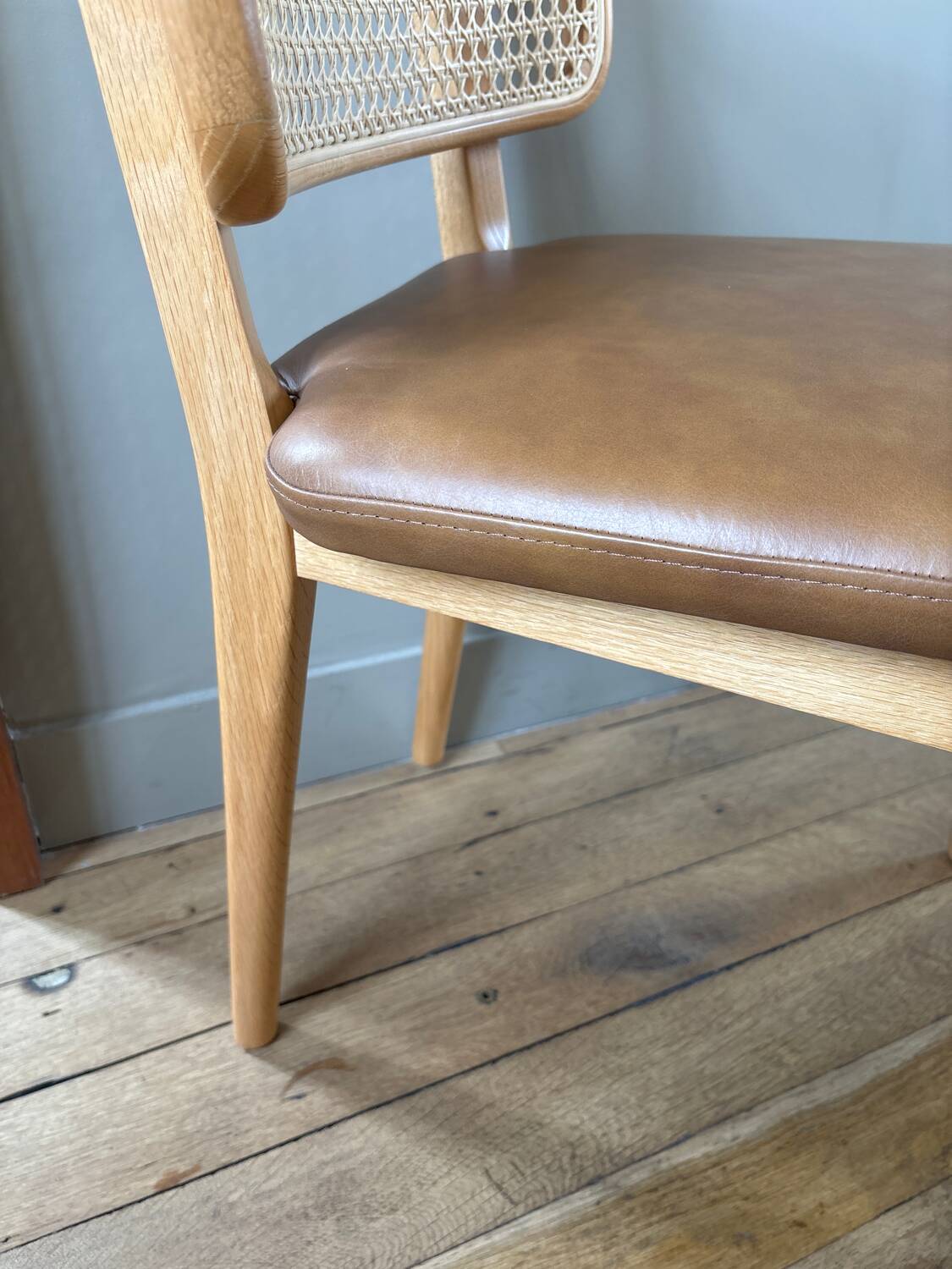 Red Edition cane chair in tobacco leather