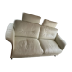 Ecru leather 2.5-seater sofa with walnut armrests.