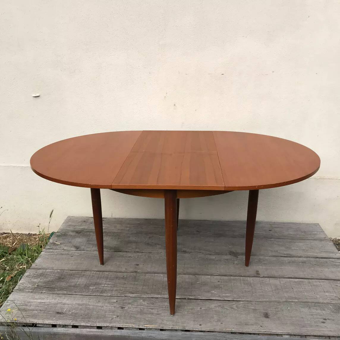 Vintage 1970s round table with extensions.