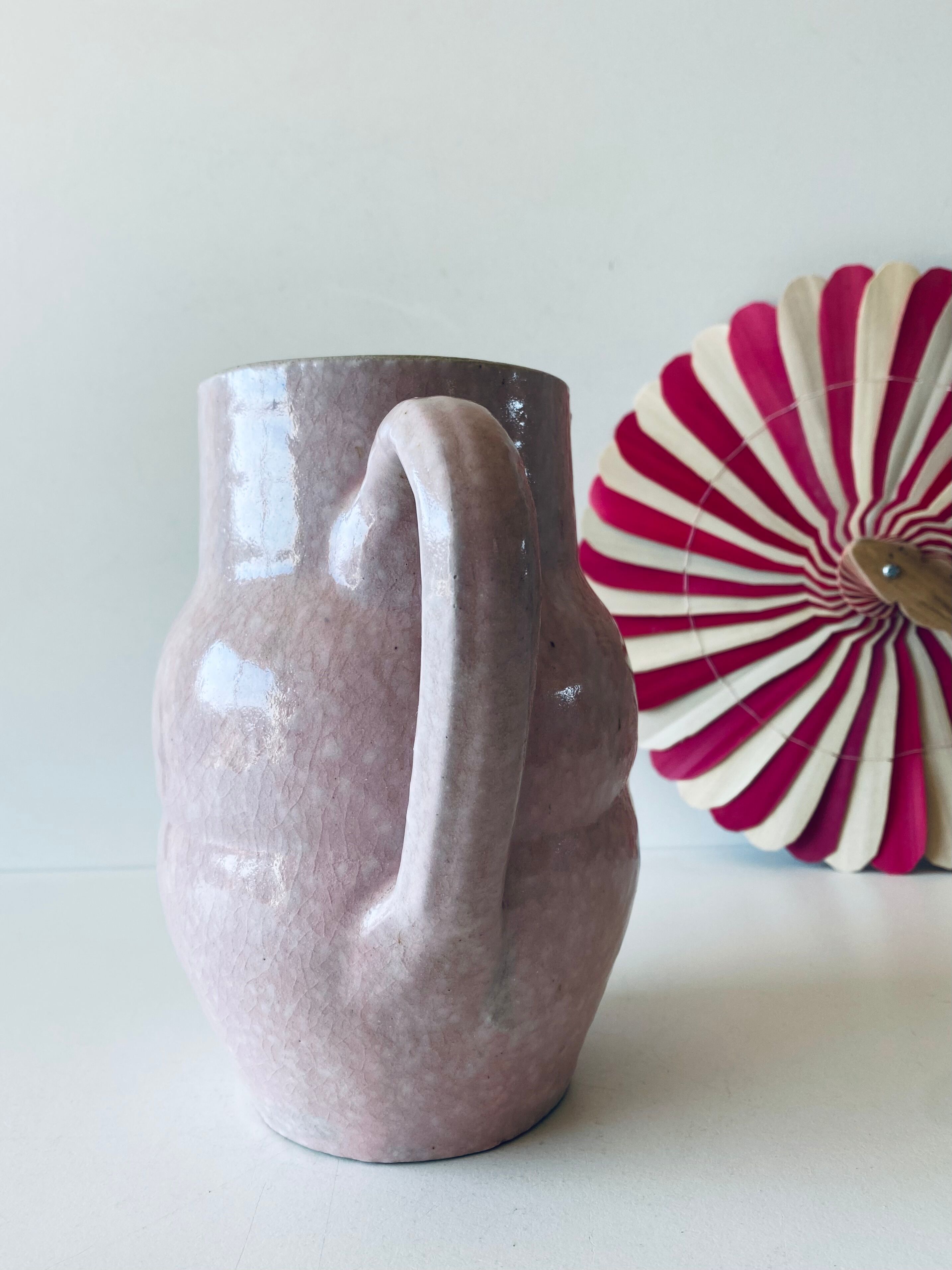 Pitcher in pink glazed ceramic