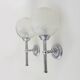 Pair of vintage Karl Lenz wall sconces. Chrome-plated metal and glass