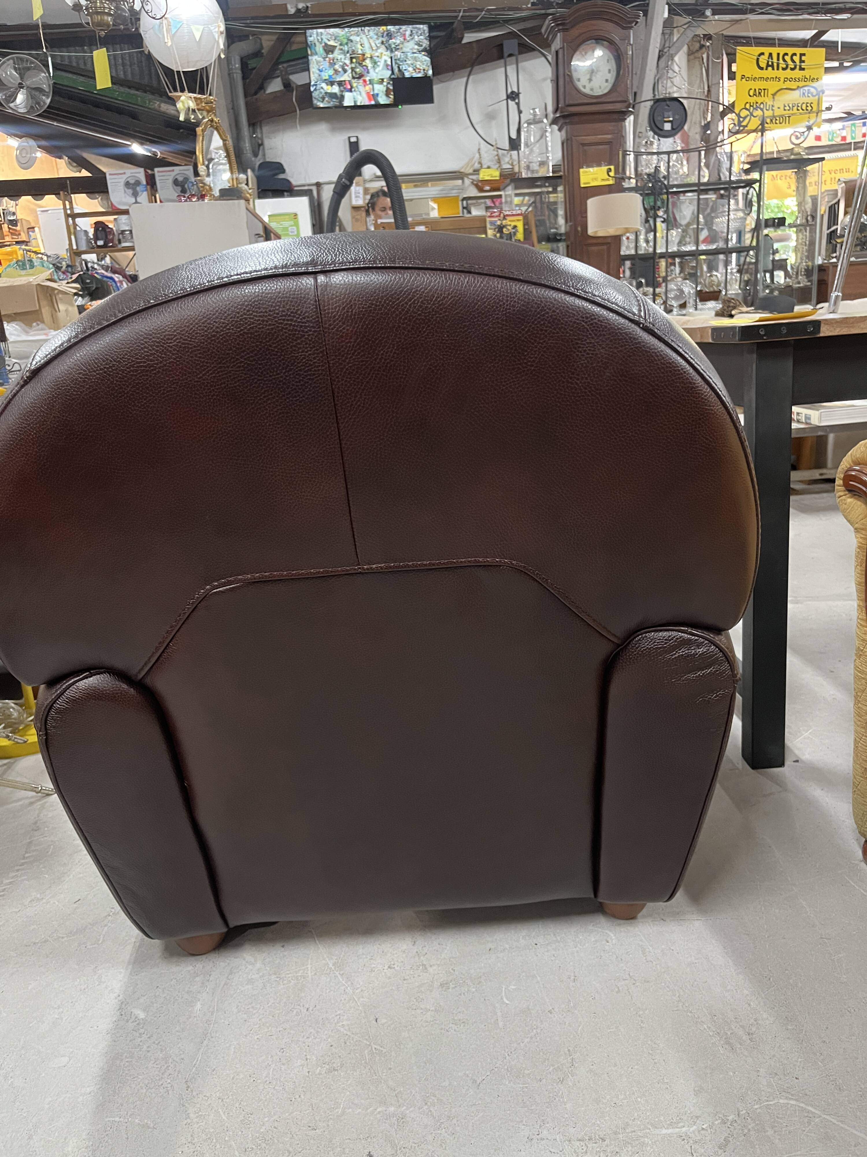 Brown leather club chair