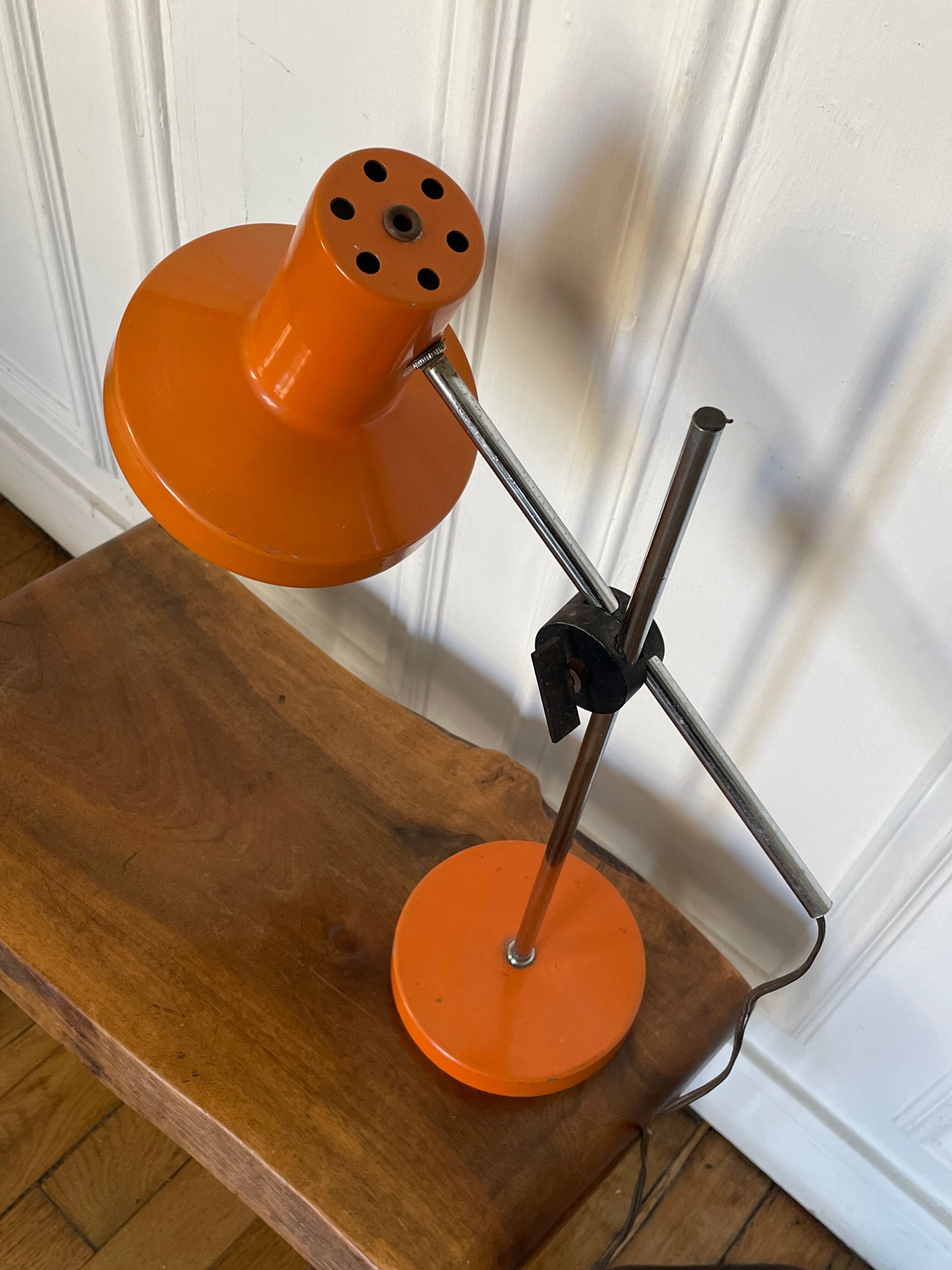 Orange articulated lamp design 1970