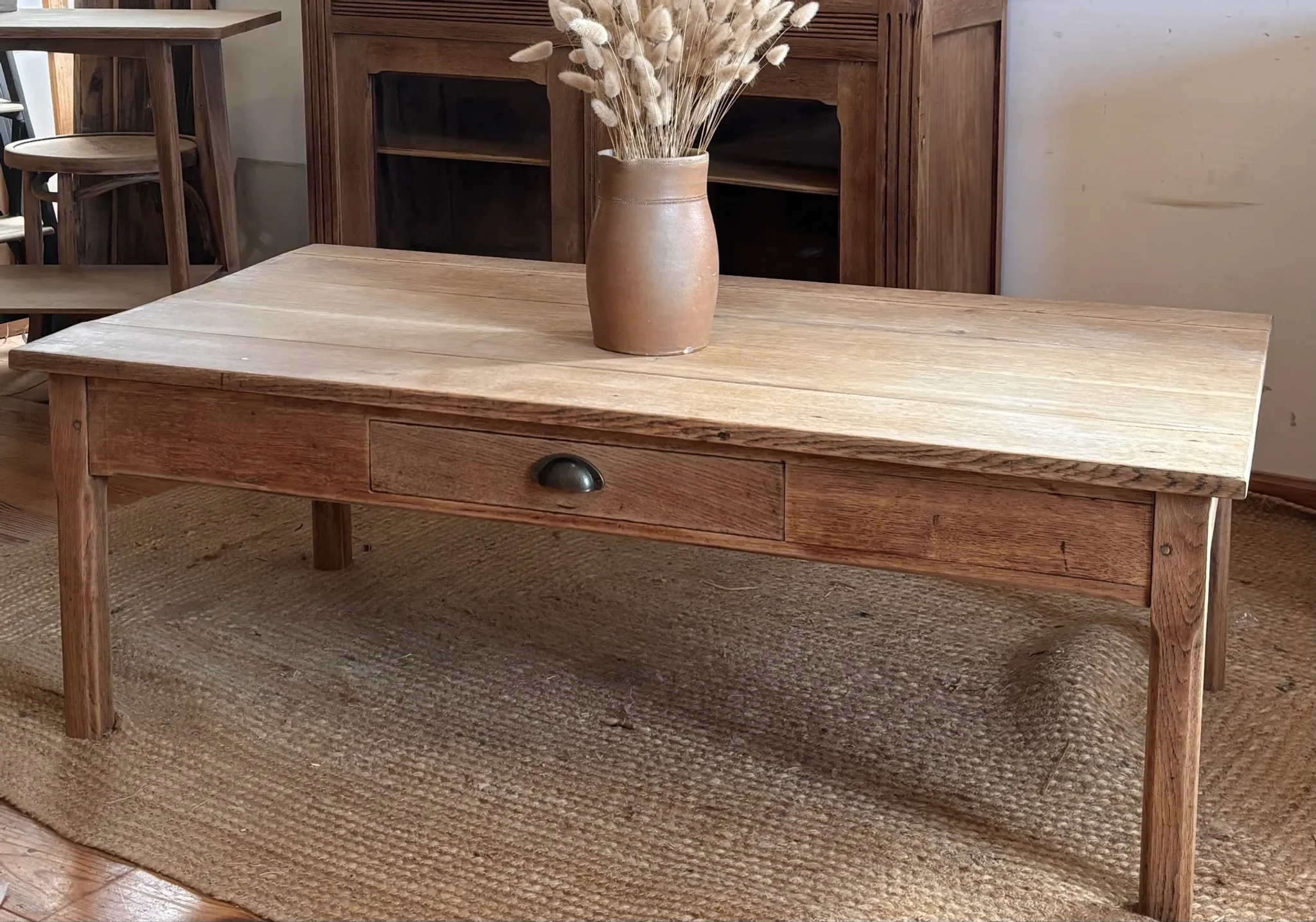 Large antique farmhouse coffee table in raw solid oak with 1 drawer.