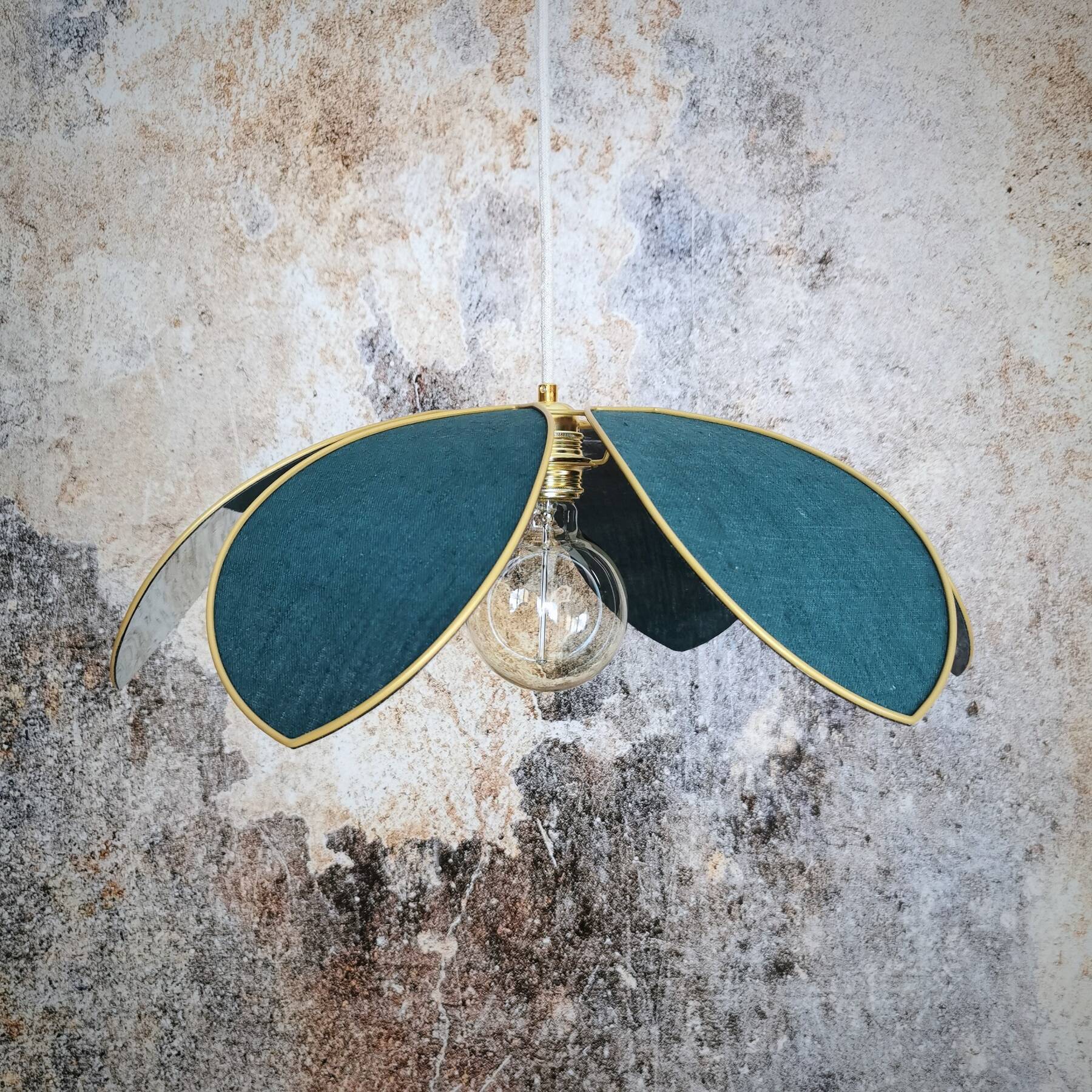Flower suspension with metal structure and peacock blue linen petals