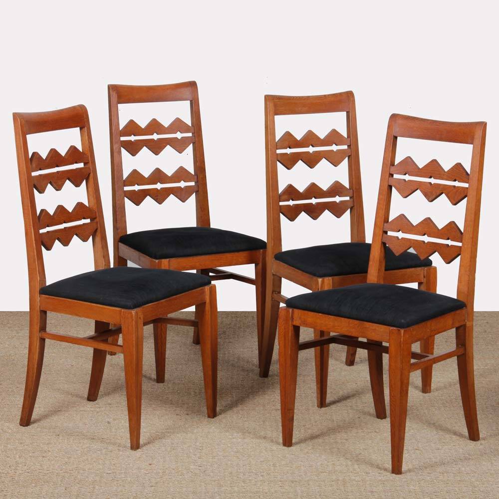 Set of 4 solid oak chairs from the 1950s.