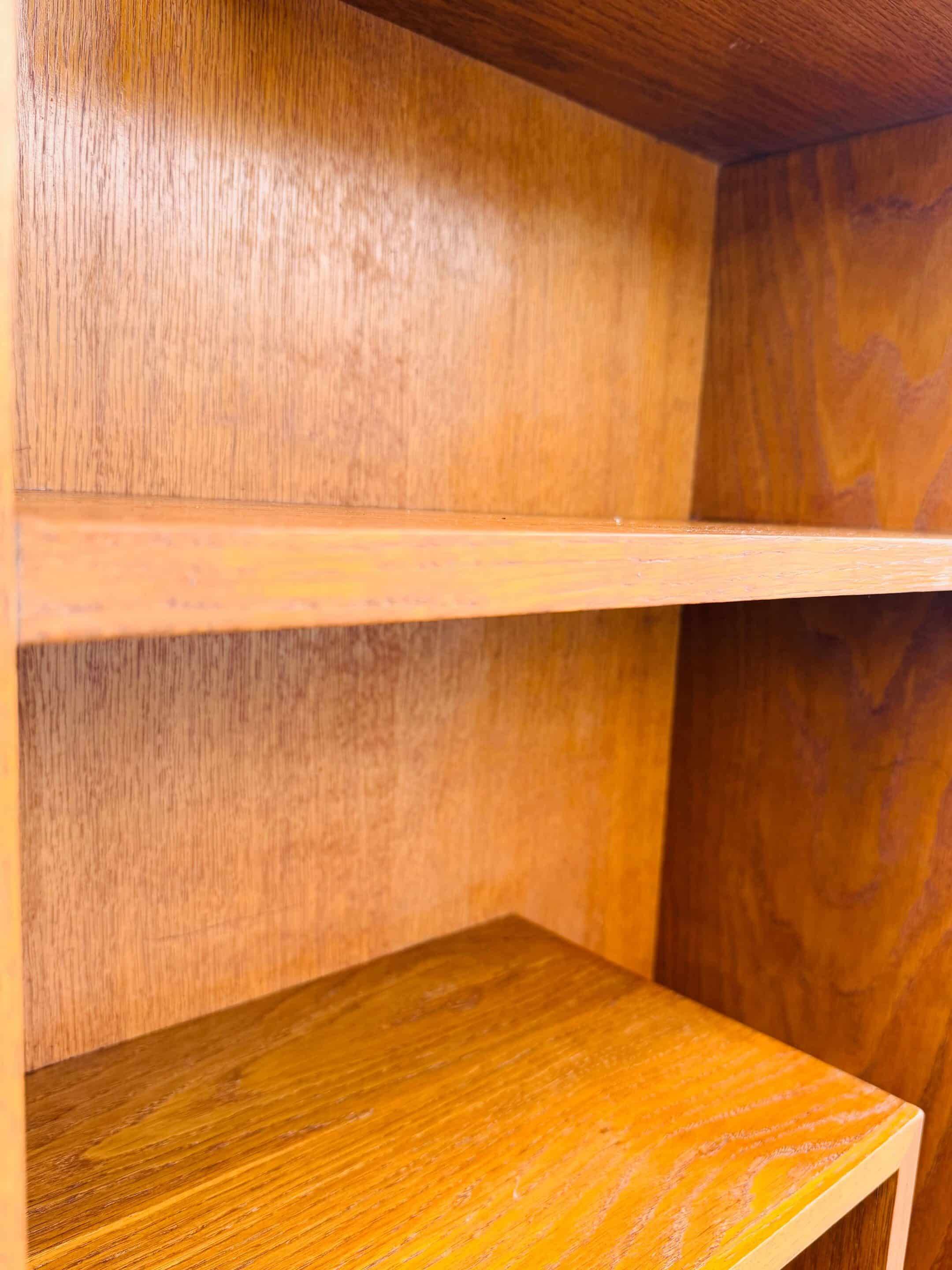 Two vintage asymmetrical storage units