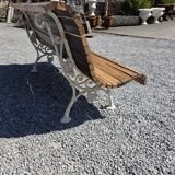 Antique garden bench made of cast iron and oak slats