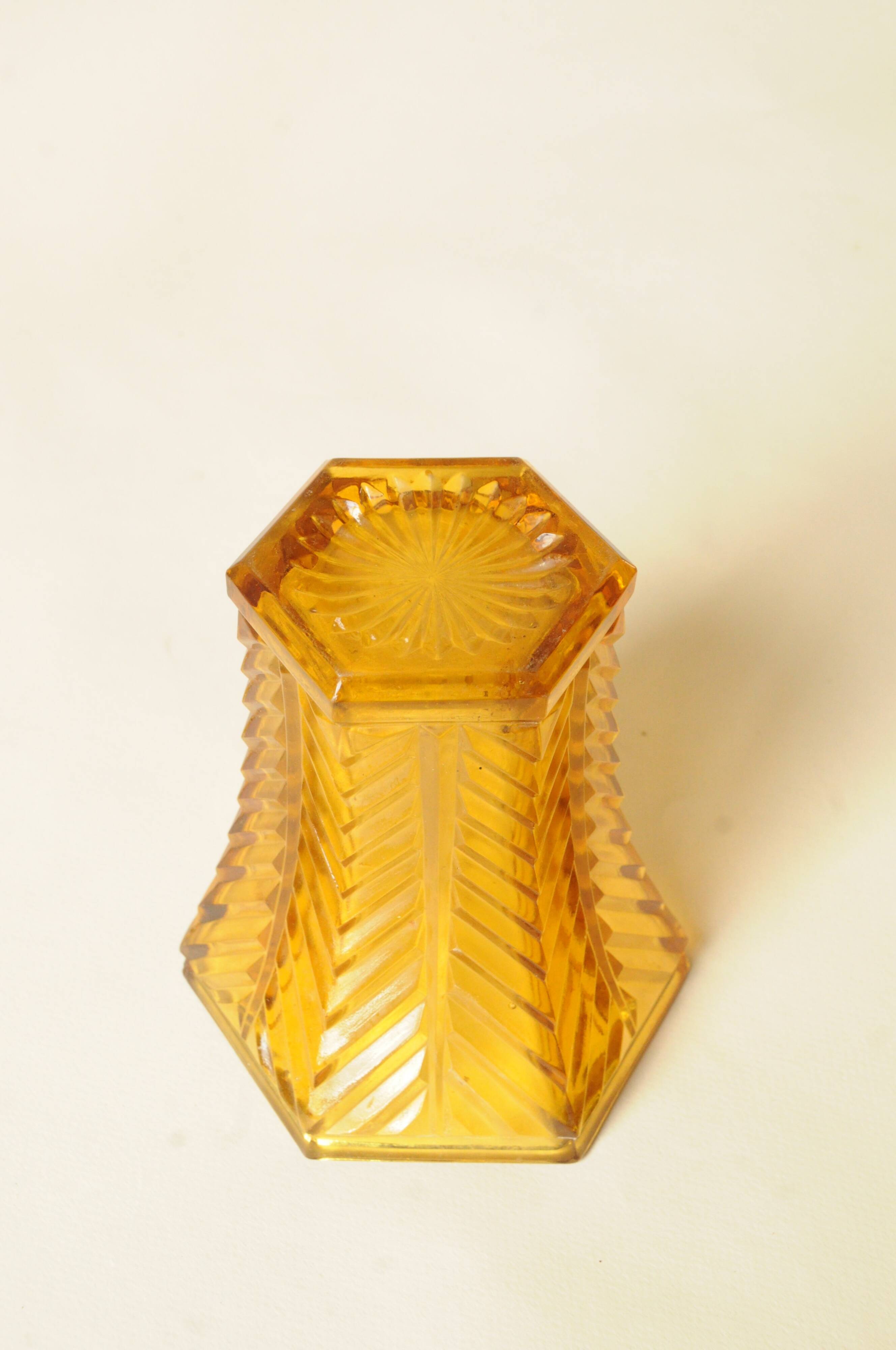 Vintage Art Deco vase in amber yellow cut glass with geometric design.