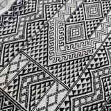 Handwoven black and white rug