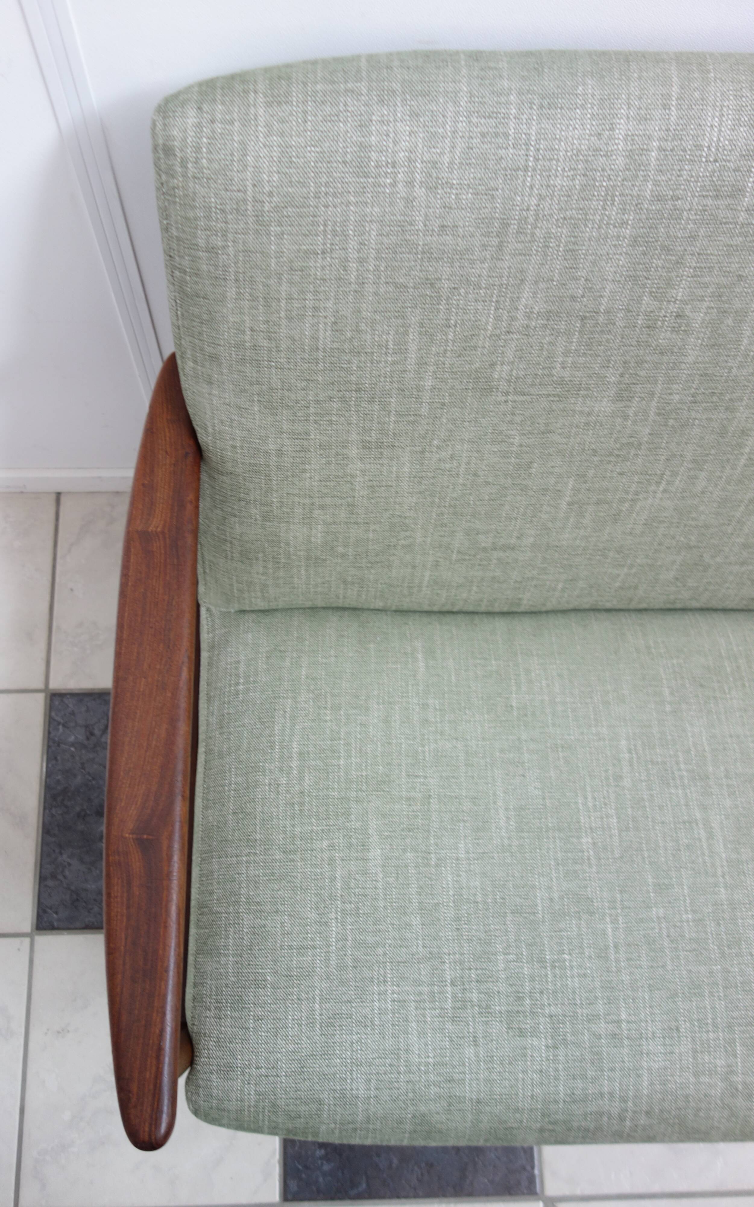Danish teak 2 seat sofa green upholstery