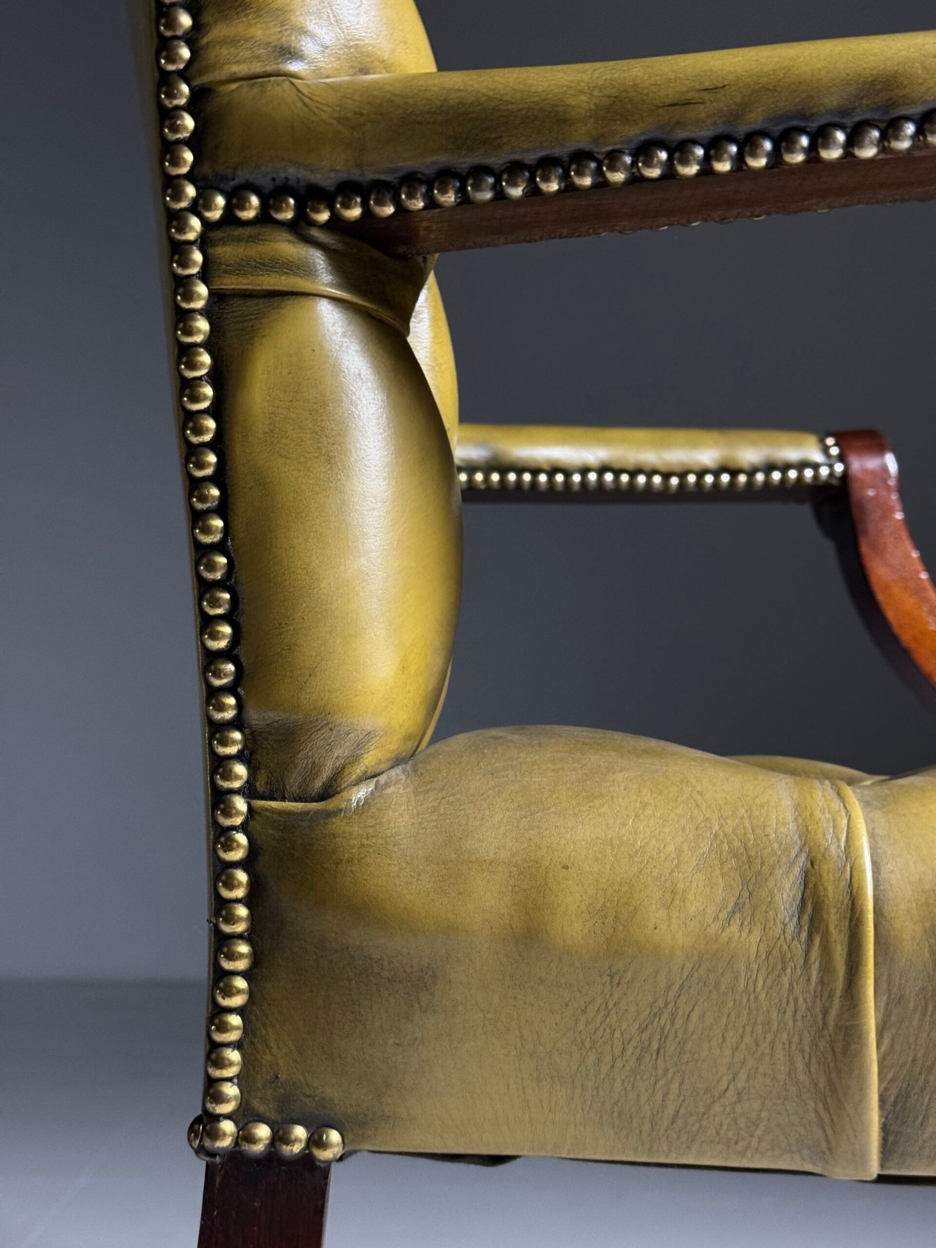 Green leather tufted office chair