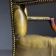 Green leather tufted office chair