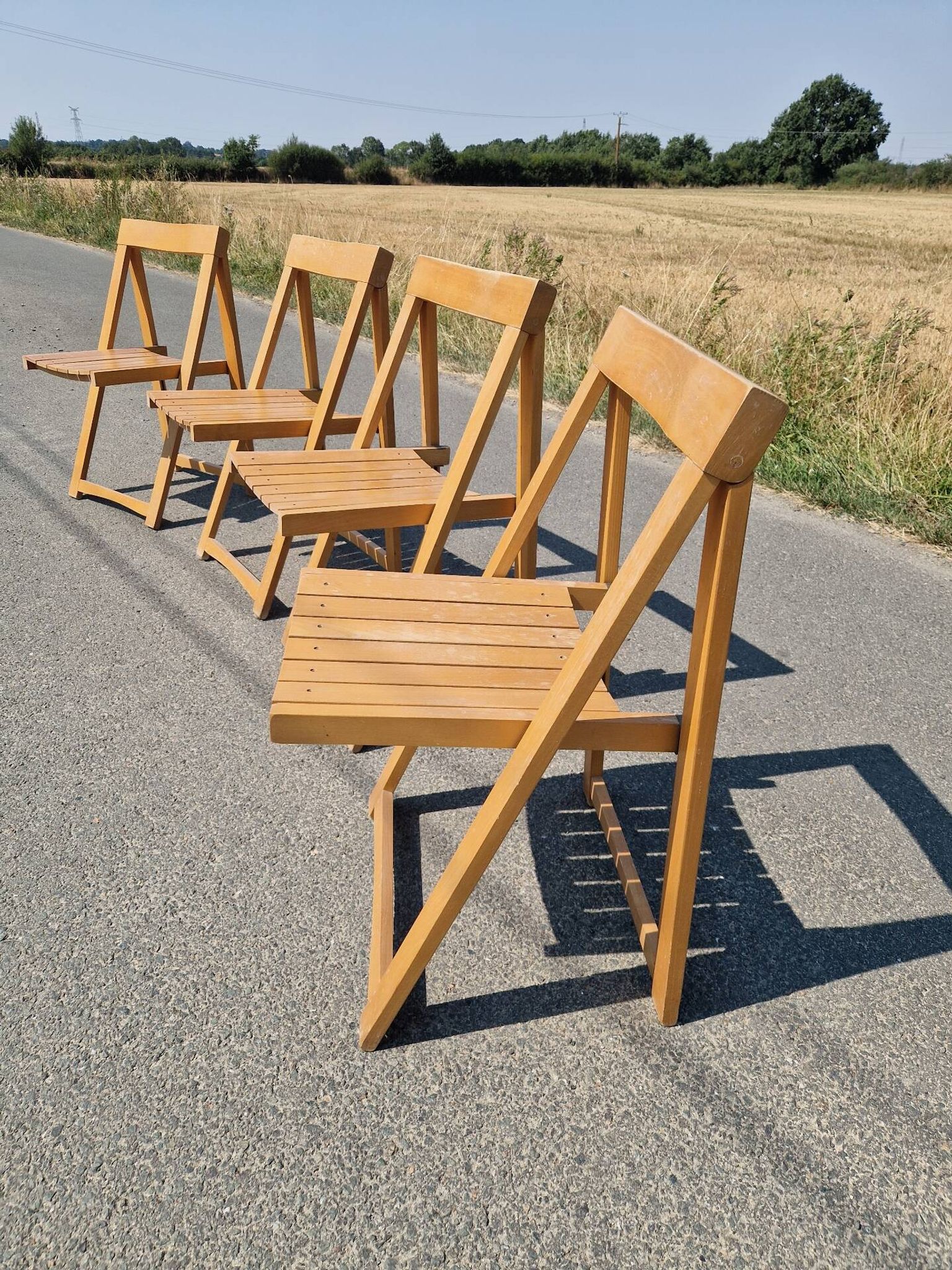 4 chaises pliantes par Aldo Jacober