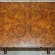 Antique extendable coffee table circa 1880 in solid walnut.