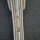 Set of 7 silver-plated dessert spoons with a bi-lobed filet pattern.