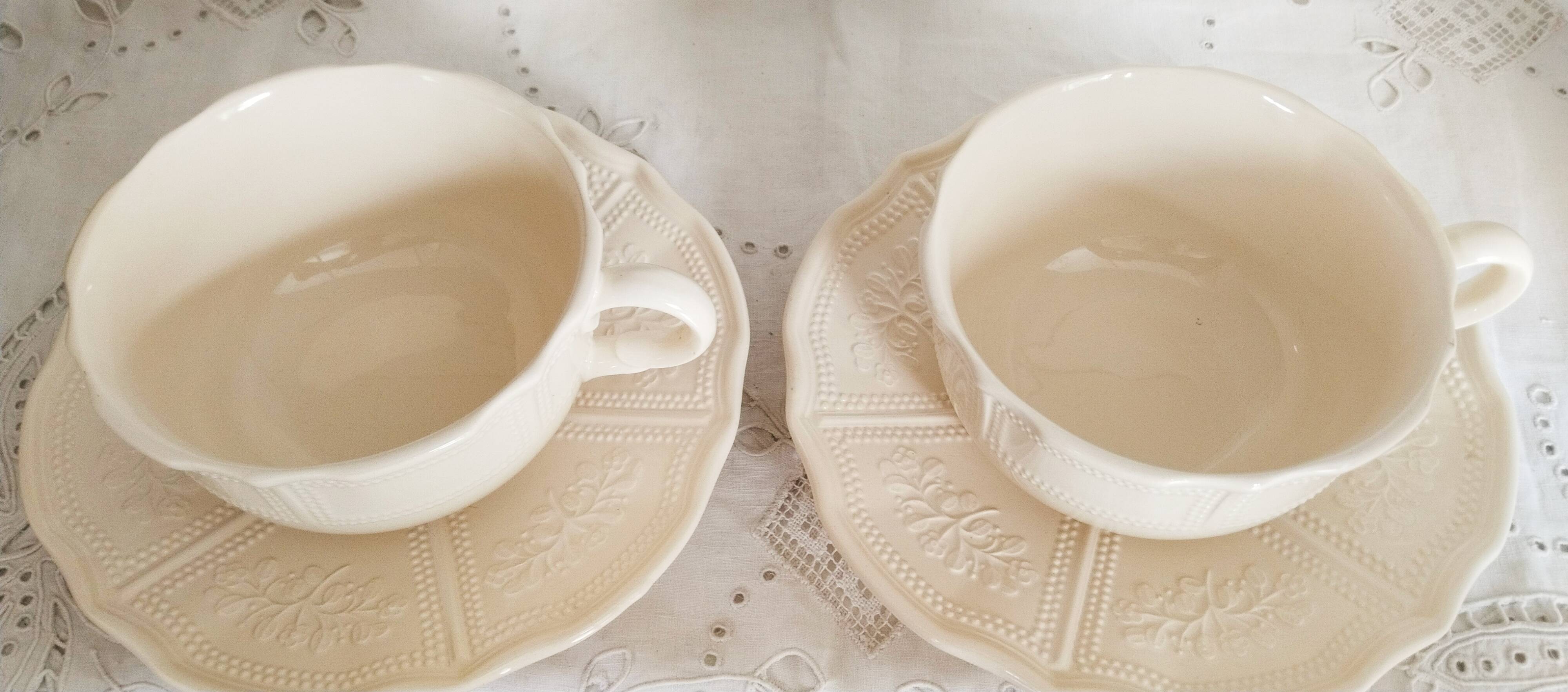 Set of 2 antique tea or chocolate cups with saucers, in earthenware from L