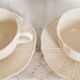 Set of 2 antique tea or chocolate cups with saucers, in earthenware from L