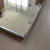 Miroir biseauté en pied ancien