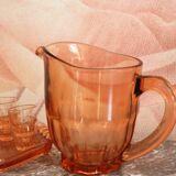 Pink glass liquor service and its accessories from the 1950s