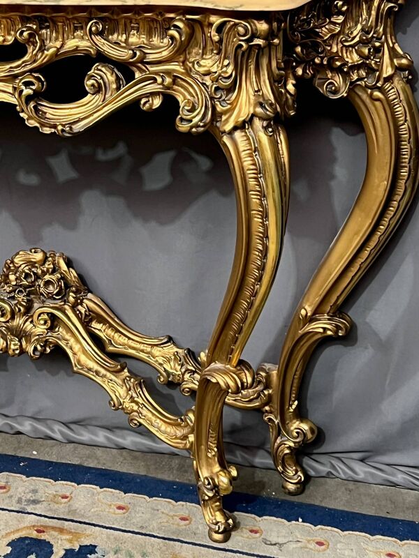 Ensemble miroir avec console bois doré style baroque dessus marbre.