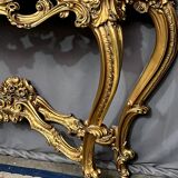 Mirror set with baroque style gilded wood console on marble top.