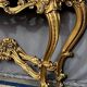 Mirror ensemble with golden wood console in baroque style with marble top.