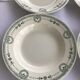 7 Old dark green Digoin hollow plates