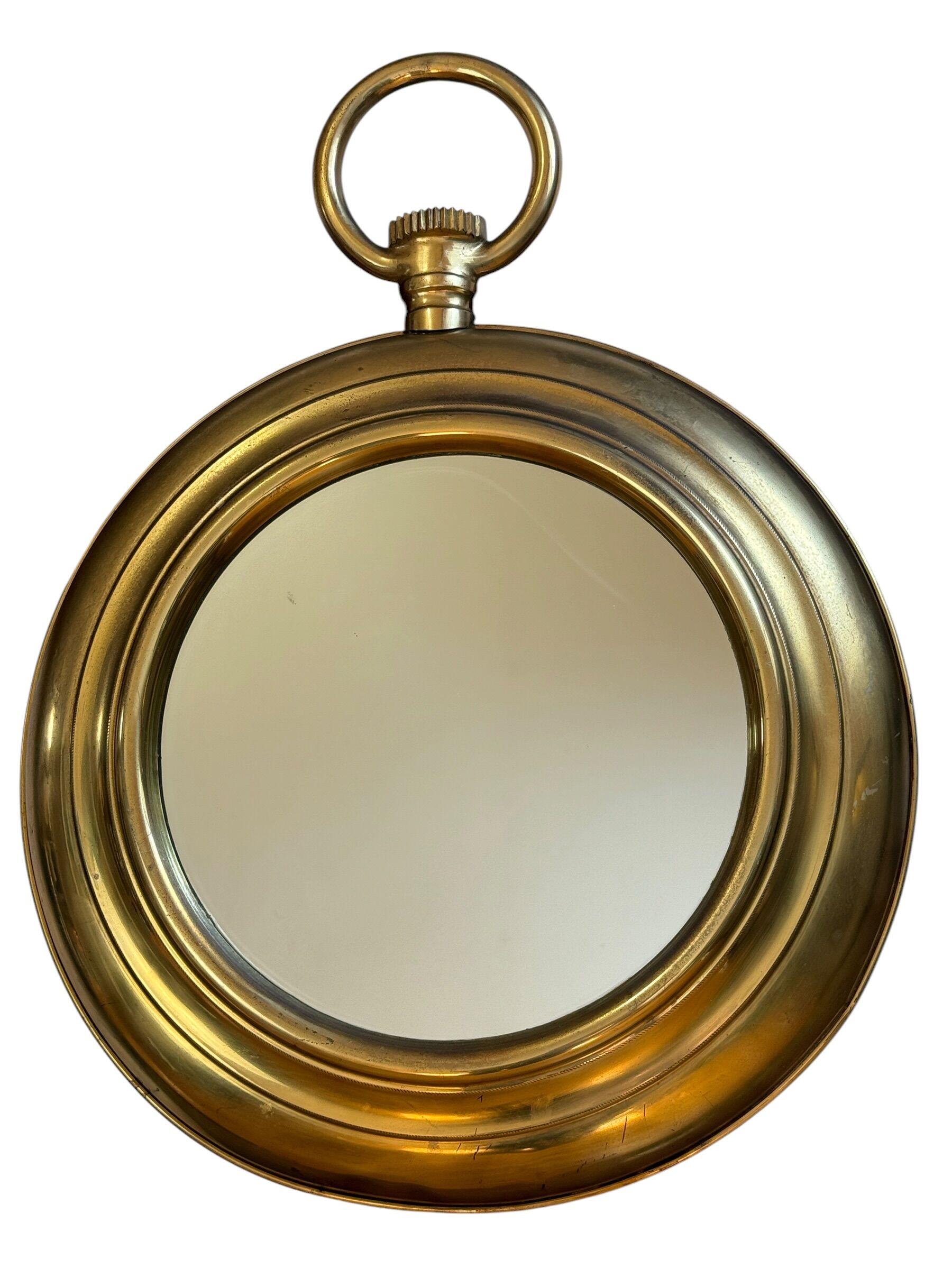 Large brass mirror in the style of Piero Fornasetti, 60 Italy.