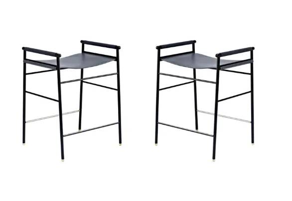 Pair of backless bar stools in blue leather and black metal.