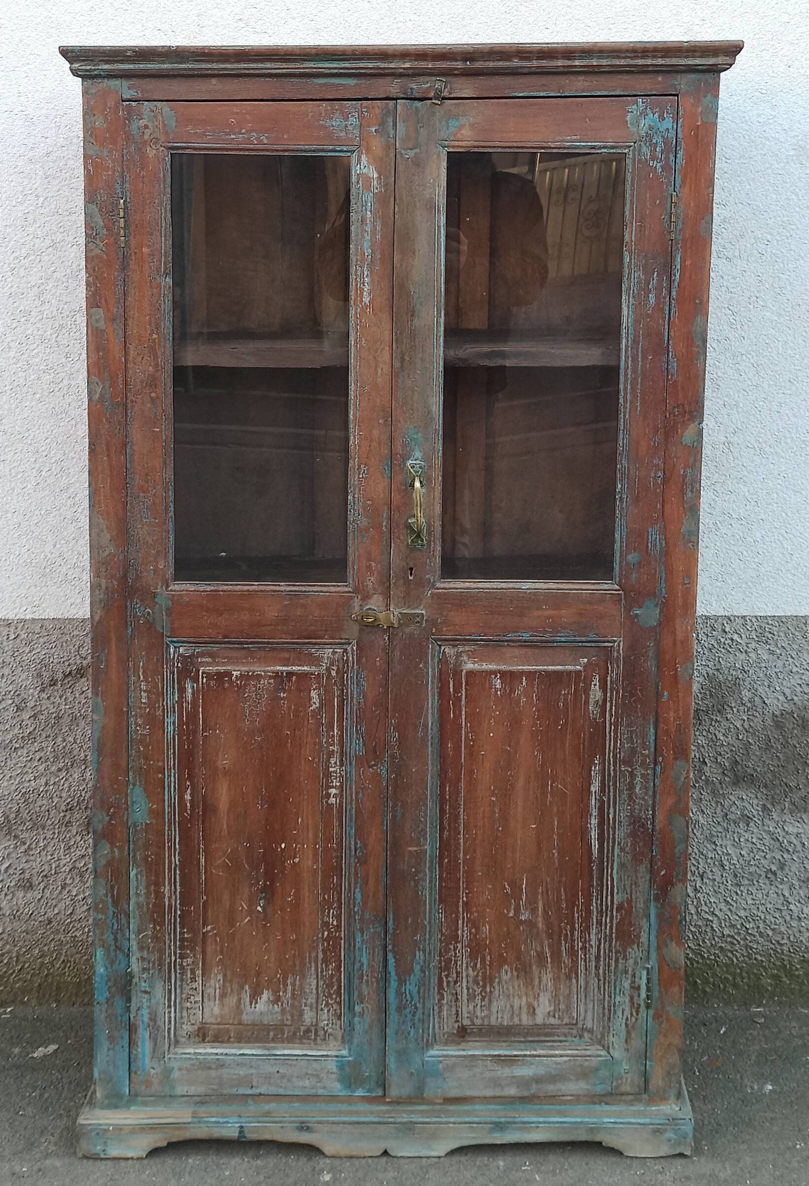 Old glazed wooden cabinet with beautiful patina