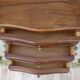 Louis XV bedside table in walnut, 3 drawers, raised edges on the tops.