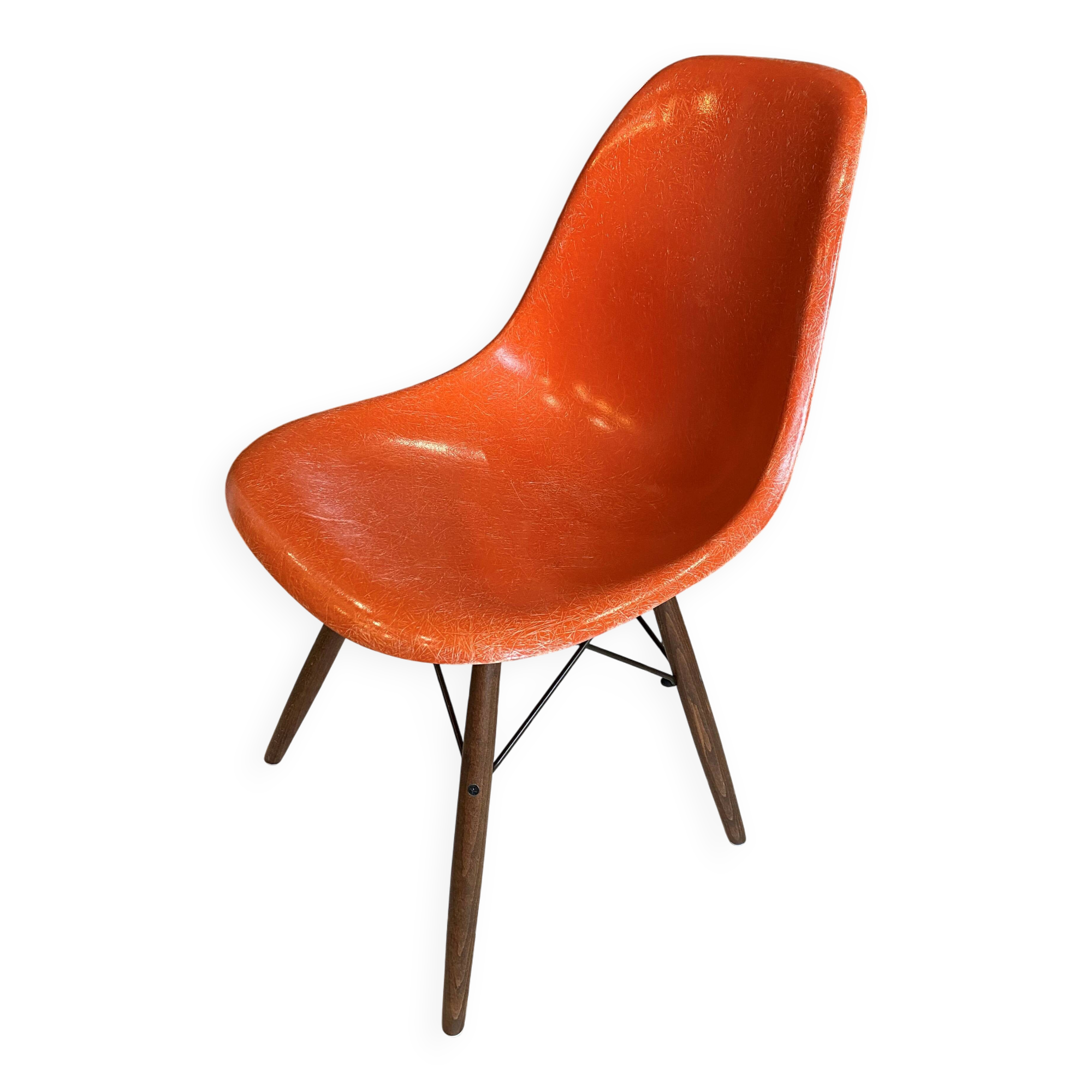 A vintage 70s Eames Herman Miller DSW Fiber Red Orange Dowel Walnut Chair