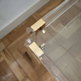2 side tables in plexiglass, glass, and brass.