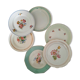 Pitted old flat earthenware plates with gold