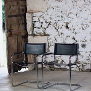 Pair of Bauhaus cantilever armchairs in chromed metal and leather, 1970