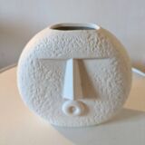 Stylized face biscuit vase