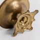 Vintage brass ashtray from the 1940s with a nude boy figurine on a footed base.