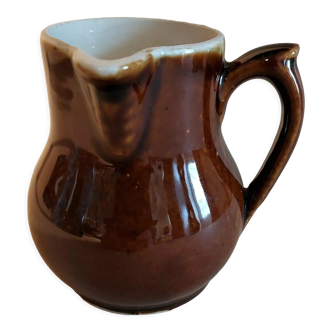 Brown varnished cream jar early twentieth century