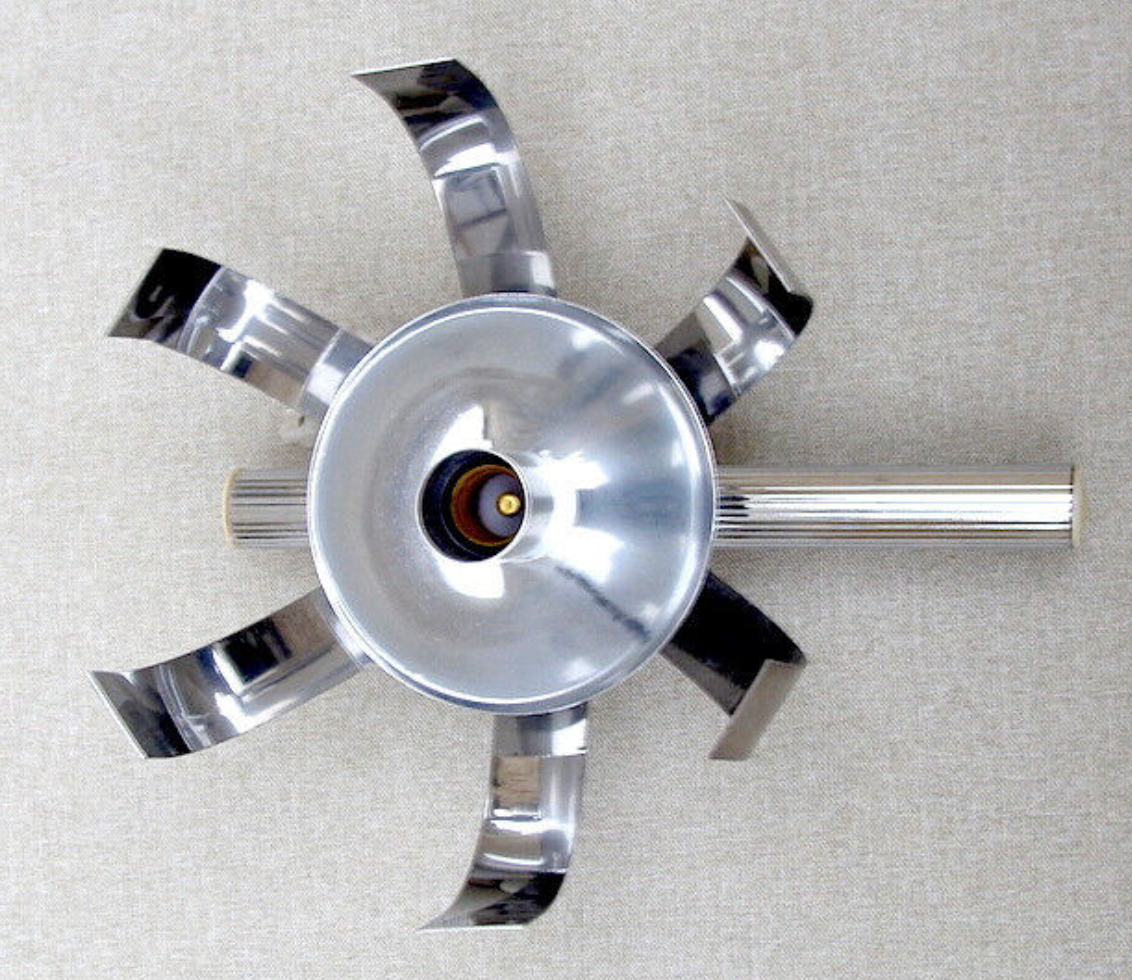Pair of wall lamps "Fleur de lumière" Trocmé chromed aluminum, 70s