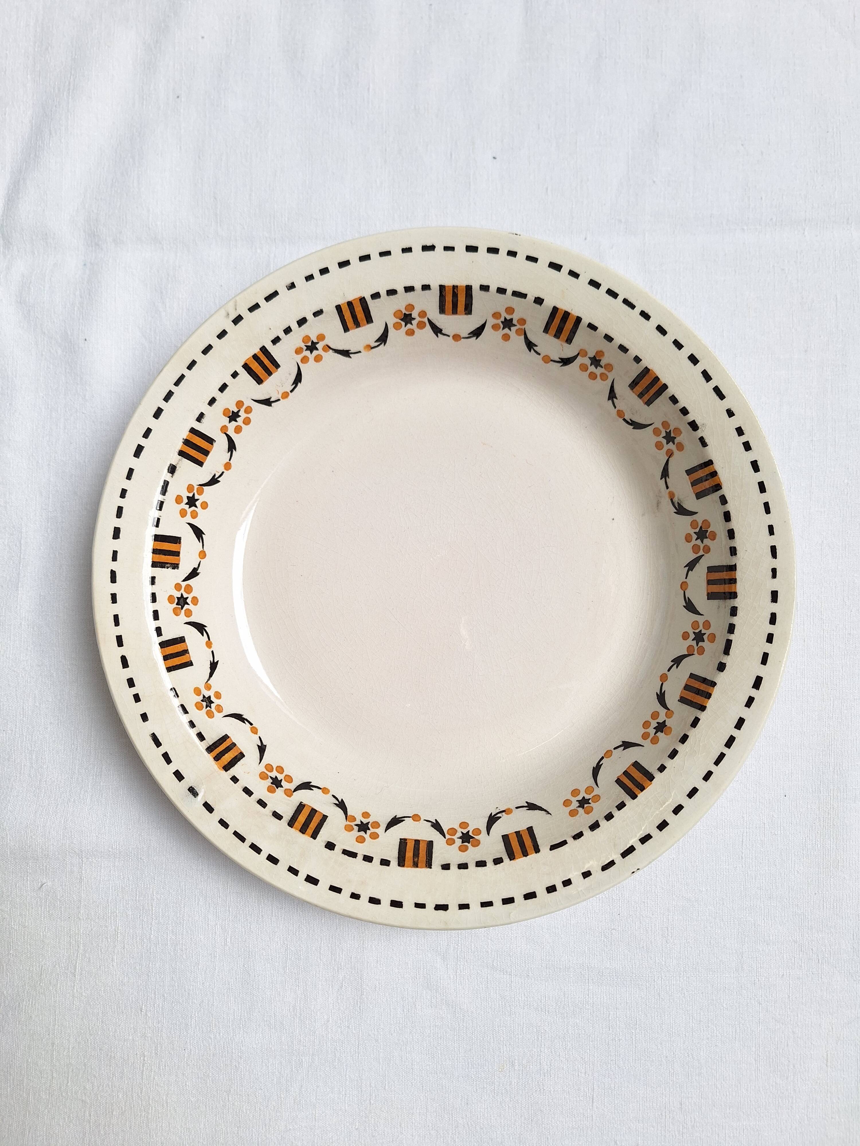Plat creux Gien orange et noir modèle 456