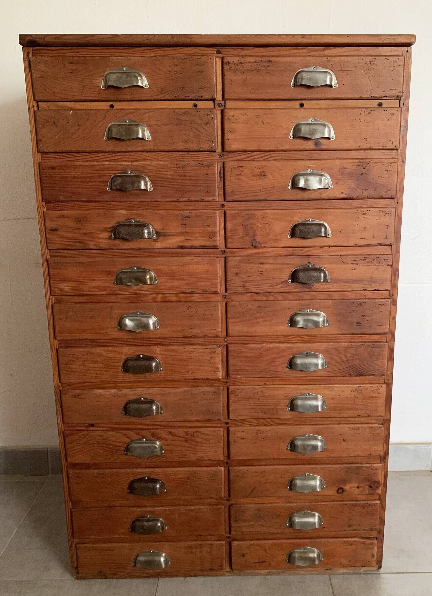 Old apothecary trade furniture in vintage wood 24 drawers.