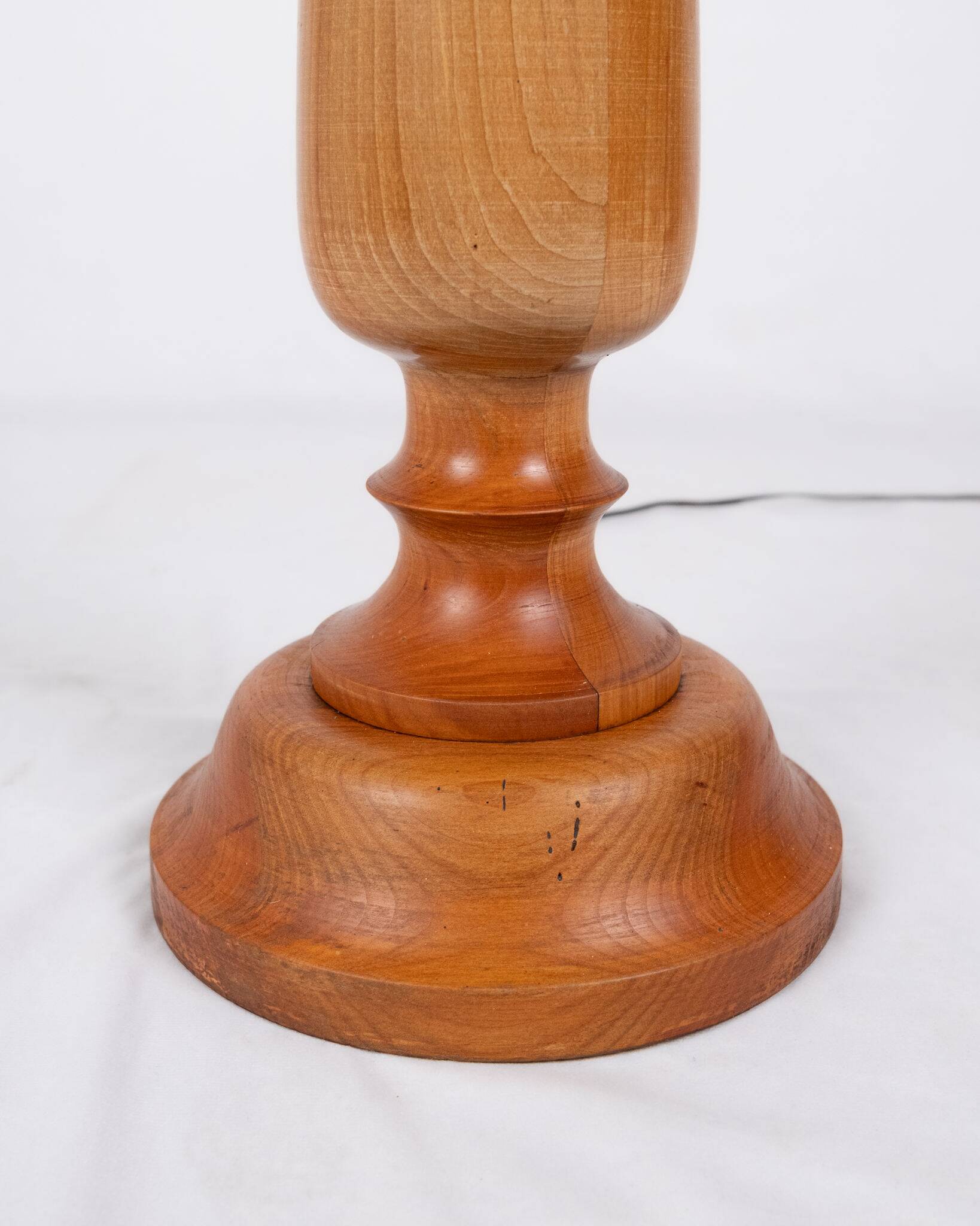 Pair of turned wooden floor lamps in Art Deco style, France, mid-20th century.