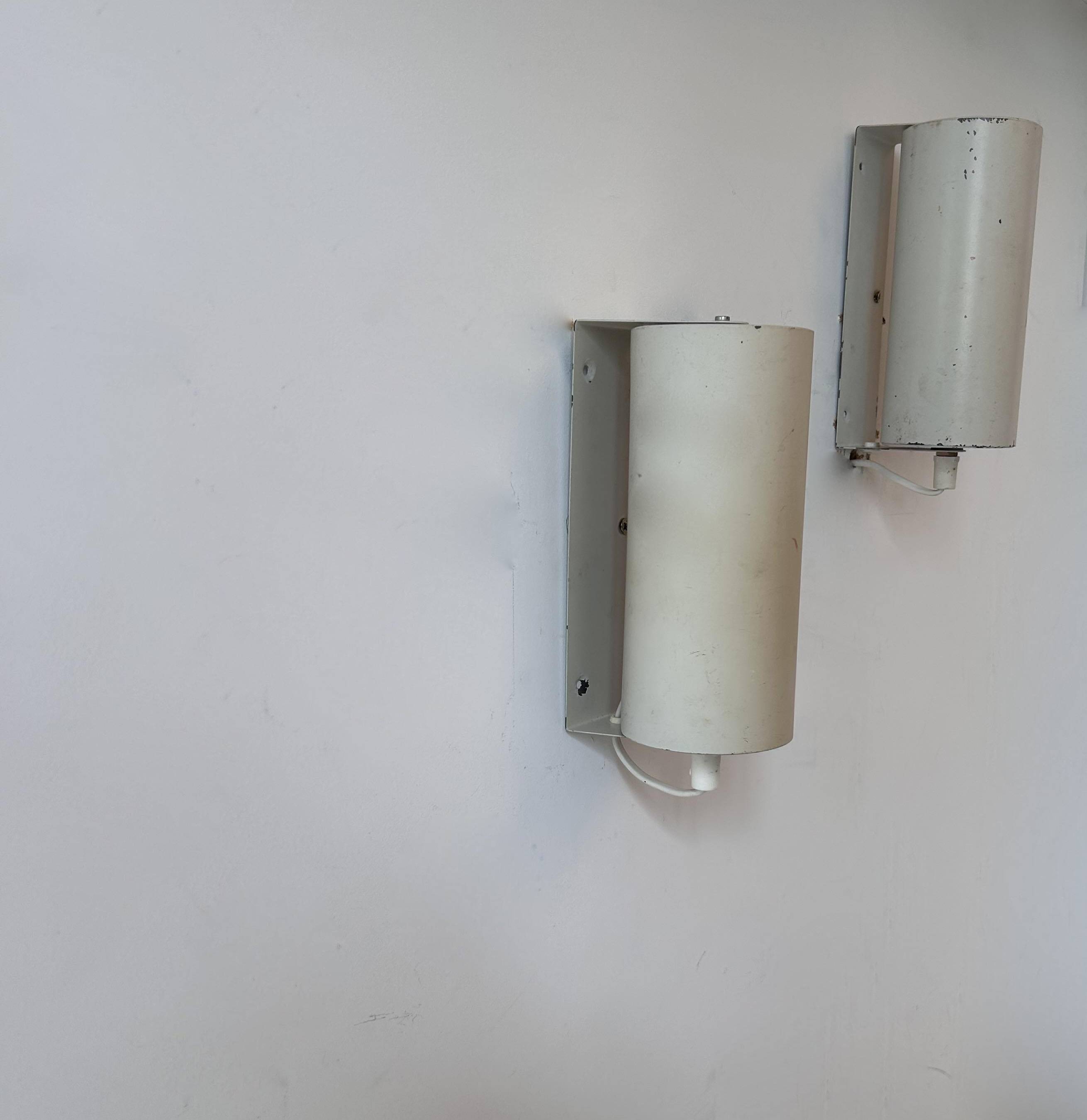 Pair of vintage adjustable wall lights, white metal, Sweden 1970